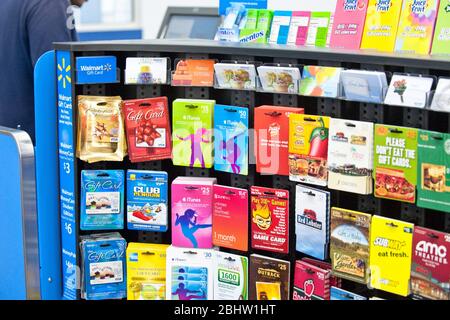 Austin Texas USA, October 26 2010: Large selection of gift cards from various businesses, from chain restaurants to movie theaters and more, on display at Wal-Mart store. ©Marjorie Kamys Cotera/Daemmrich Photography Stock Photo