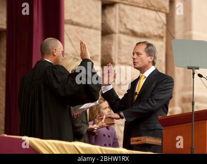 Austin, Texas USA, January 18 2011: Chief Justice of the Texas Supreme Court Wallace Jefferson (L) performs swearing-in ceremony for Lt. Governor David Dewhurst at the Texas Capitol. ©Marjorie Kamys Cotera /Daemmrich Photography Stock Photo