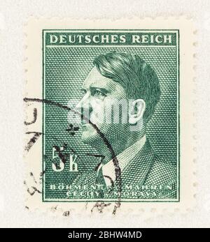 SEATTLE WASHINGTON - April 25, 2020: Portrait of Adolf Hitler on Bohemia and Moravia Deutsches Reich stamp during 1942 German Occupation. Scott # 77 Stock Photo