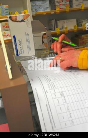Hygiene measures in a pharmacy during the COVID-19 pandemic. In Normandy, France. Stock Photo