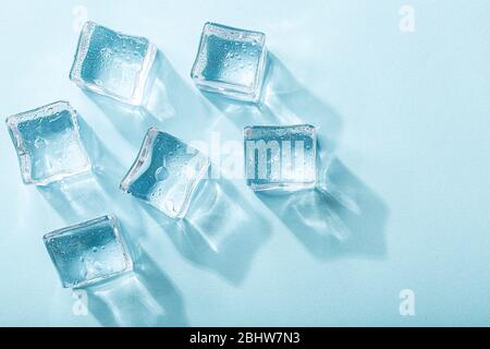 Colored banner with fresh ice cubes and reflections Stock Photo