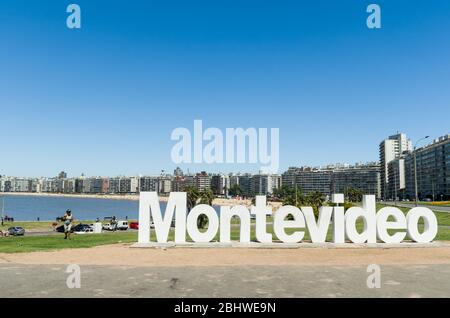 MONTEVIDEO, URUGUAY - Dezember 25, 2015: Landmark place at pocitos beach in which is located the montevideo letters, a place for tourist to take souve Stock Photo