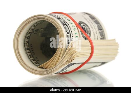 A lot of one hundred dollar bills tied rubber band isolated on white Stock Photo