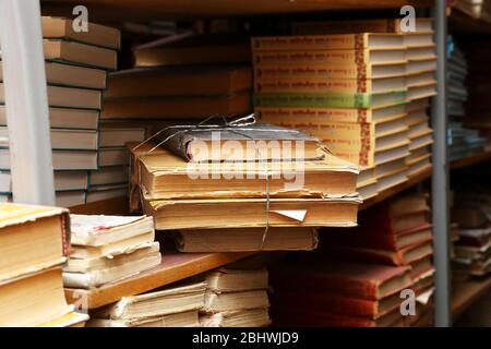 Many books on bookshelf in library Stock Photo