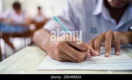 School students  taking exam answer in classroom with stress.16:9 style Stock Photo