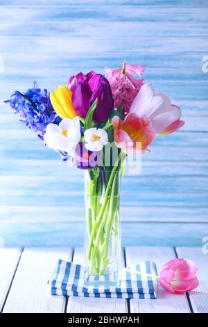 Beautiful spring flowers on color background Stock Photo