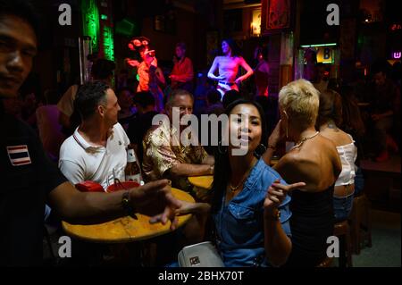 Tourists at an outdoor bar, Khaosan Road, Bangkok, Thailand Stock Photo