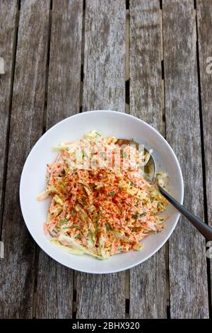 Coleslaw in a white bowl Stock Photo
