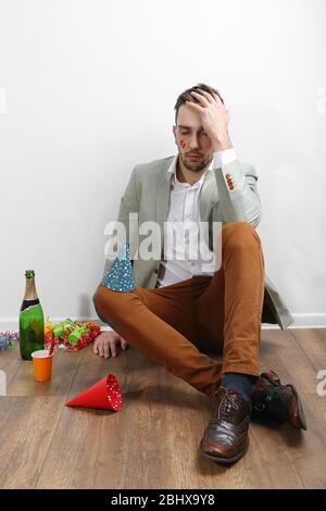 Young man after fun in room Stock Photo