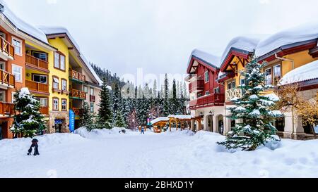 Colorful buildings in the Winter Sport Village of Sun Peaks, an Alpine Village in the Shuswap Highlands of British Columbia Stock Photo