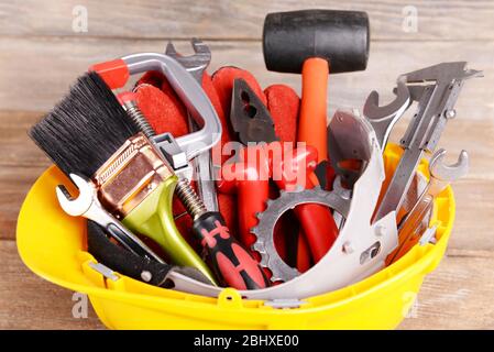 Construction tools in helmet close up Stock Photo