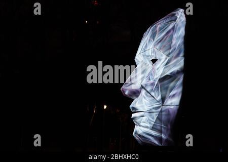 Face projected on the real white face sculpture Stock Photo