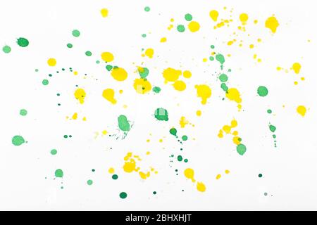 Bright paint blots on paper close up Stock Photo