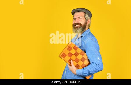 human brain working. brainstorming concept. play chess tournament. Intelligence level measurement. level up your iq. bearded man hold chess board. intelligence quotient concept. copy space. Stock Photo