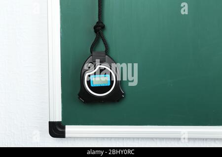 Sport timer on blackboard background Stock Photo