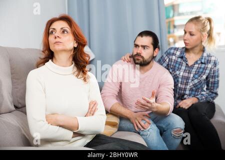 The son-in-law makes claims to the mother-in-law Stock Photo