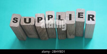 SUPPLIER word made with wooden blocks. Business concept Stock Photo
