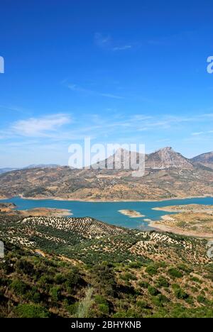View across the reservoir towards the mountains, Zahara de la Sierra, Andalucia, Spain Stock Photo