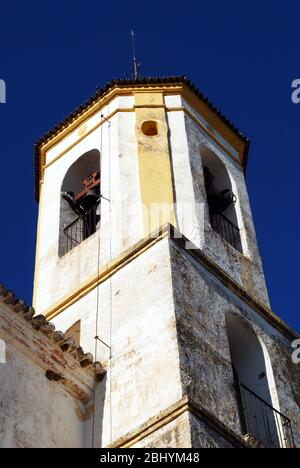 The bell tower to the Incarnation Church (built in 1505), Yunquera, Malaga Province, Andalucia, Spain, Western Europe. Stock Photo