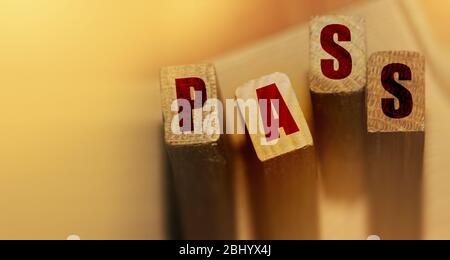 PASS word made with building blocks. Pass or fail concept, positive answer concept Stock Photo