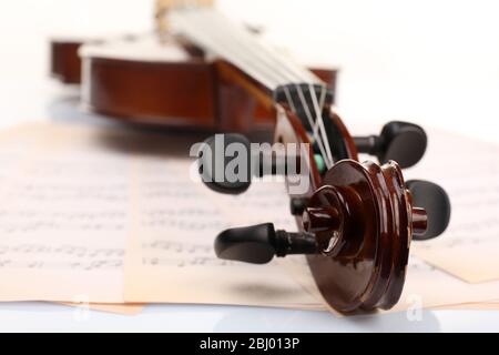 Classical violin on music sheets background Stock Photo