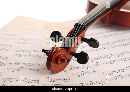 Classical violin on music sheets background Stock Photo
