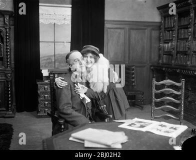 A scene from ' Everybody ' s Business ' a food economy film . - Miss Renee Kelly and Mr Norman KcKinnel . - 1917 - Stock Photo