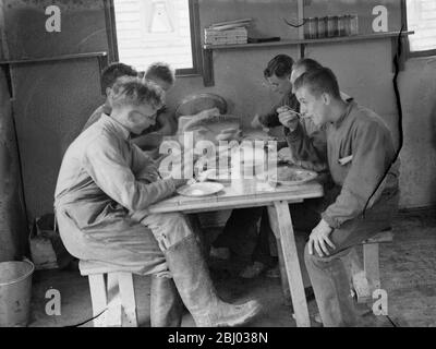 Territorial Army recruits at camp in Chichester , Sussex . - Dinner is served . - 1939 Stock Photo