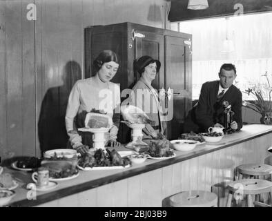 Sir CHarles Burdett and Baroness Poppy Rednig Von Trebnitz run restaurant in the city . - Sir Charles Burdett , with Baroness Poppy Hedwig von Trebnitz , and Miss Grace Corwell , for four years a V A D who was decrated during the war , have opened a restaurant together in Bridge Lane , Fleet Street . - Left to right Baroness Poppy Hedwig von Trebnitz , Miss Grace Corwell and Sir Charles Burdett at their restaurant . - 29 June 1932 Stock Photo