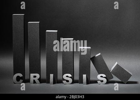 Falling crisis 3d bar chart made in black color over shades of gray Stock Photo