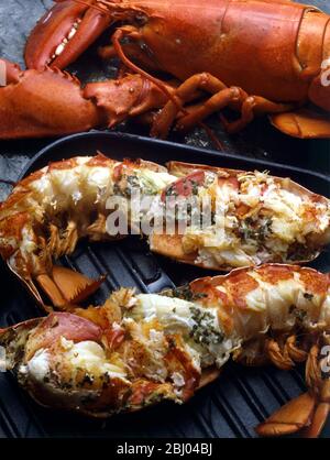 Homard grille maitre d'hotel - grilled lobster with lemon and herb butter Stock Photo