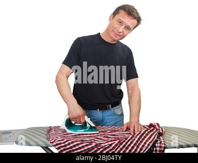 Adult man independently irons his shirt, isolated on white Stock Photo