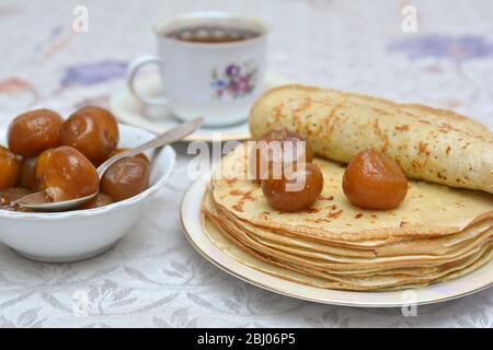 Pancakes on a plate with fig jam Stock Photo