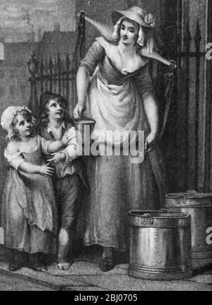 Milkmaid With Pails Stock Photo - Alamy