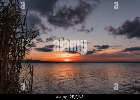 Magical summer sunset at Vaya lake, Burgas city, Bulgaria Stock Photo