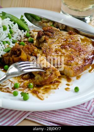 Pork chop with rice and vegetables - Stock Photo