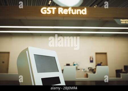 Tax refund booth at terminal Stock Photo