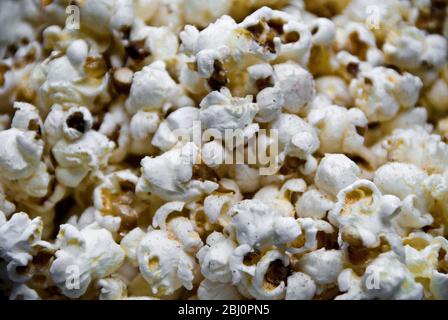 Close up of freshly popped popcorn - Stock Photo