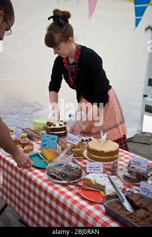 Cake stall, Whitecross Street market, London EC1 - Stock Photo
