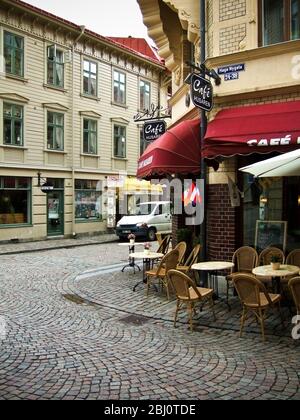 Cafe on corner of cobbled street in Haga, the old working class district of Gothenburg, Sweden, now a prosperous and fashionable area of the city for Stock Photo