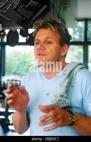 Gordon Ramsay in his kitchen at home - Stock Photo