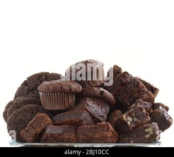 Pile of organic chocolate muffins and brownies - Stock Photo
