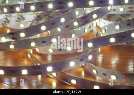 LED strip on a wooden table Stock Photo