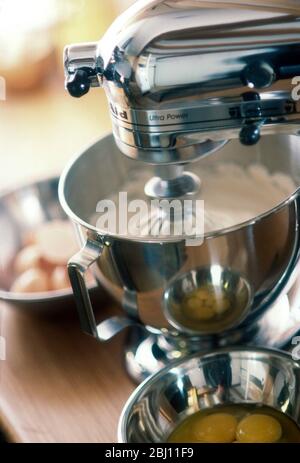 Kitchen aid mixer being used to make a cake - Stock Photo
