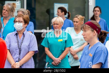 Harrogate, North Yorkshire, UK. 28th Apr, 2020. Doctors, nurses and all NHS keyworkers outside Harrogate District Hospital to honour their colleagues who lost their lives to Covid 19 observing one minute of silence. Credit: ernesto rogata/Alamy Live News Stock Photo