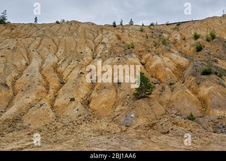 Bor / Serbia - July 13, 2019: Soil erosion and degradation due to industrial pollution in copper mine in Bor, Serbia, owned by Chinese mining company Stock Photo