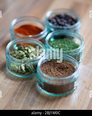 Jars of spices and beans and herbs Stock Photo