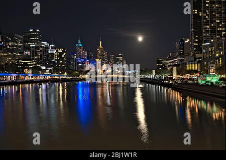 The skyline of Melbourne and the Yarra river during supermoon Stock Photo