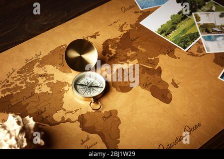 Marine composition with compass and cards on table close up Stock Photo