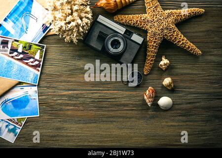 Beautiful composition with sea accessories and camera on table close up Stock Photo